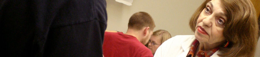 Mrs. Elsie Smith discusses biology with a student.