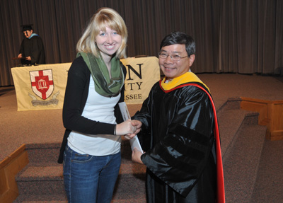 Claire Elmblad receives his award