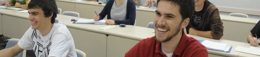 Dr. Van helps some students in lab.