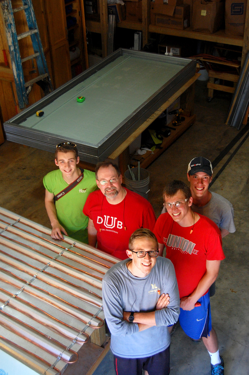 Project members pose with their work