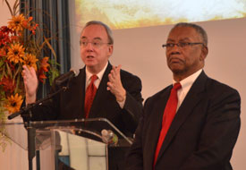 Union President David S. Dockery (left) speaks at Agape Christian Fellowship's 10-year anniversary celebration Nov. 4. Roland Porter (right), is the church's pastor. (Photo by Morris Abernathy)
