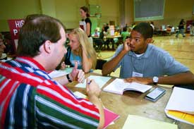 Incoming Union freshman Anthony James of Jackson, Tenn., listens as assistant political science professor Sean Evans discusses a class Tony will be taking in the fall.
