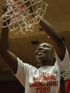 DJ Sissoko cuts down a piece of the net following Union's 79-62 win over Lubbock Christian in the 2006 NAIA National Championship Game. (Photo by Jim Veneman)