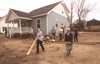 3/26/03 - The GO Battle Creek team cleans up a Habitat for Humanity work site.
