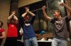 Fans cheer as their water polo team scores a goal during the championship game held by the Wellness Center. - Photo by Beth Spain