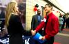 Danny Song, senior journalism major, shakes hands with Kristina Langal, TEK systems recruiter, at the CareerU fair.  Students discussed career opportunities and got a foot in the door with several companies in the area.  - Photo by Kristi McMurry