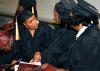 Vera Lewis, Aline Averyhart, and Dwana Parker, all receiving bachelor of science in nursing degrees, fellowship with each other before fall graduation. - Photo by Kristi McMurry