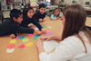 Crane gains meaningful teaching experience while helping students in her class through learning games and other teaching methods. To accomodate the growing number of students in ESL programs across the country, some teachers are being mandated to obtain ESL licensure. - Photo by Kristen Hiller