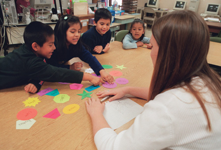 Crane gains meaningful teaching experience while helping students in her class through learning games and other teaching methods. To accomodate the growing number of students in ESL programs across the country, some teachers are being mandated to obtain ESL licensure.