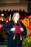 12/19/08 - Autumn Brooke Lewis, receiving her bachelor of science in organizational leadership, happily displays her diploma at the fall graduation ceremony. - Kristi McMurry