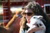 Rachel Moore, senior English major, holds a rabbit at the petting zoo.  The petting zoo was one of the many fun things to do during Arts in the Park. - Photo by Kristi McMurry