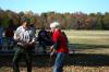 History professor Judy LeForge shares a laugh with Pinson Mounds park ranger Wesley Williams as she tries out atlatl spear-throwing during an afternoon learning session.   - Photo by Kristi McMurry