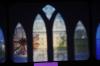 Three screens were used throughout <em>Remembering Feb. 5: An Evening of Thanksgiving</em> to coordinate images with the music. - Photo by Morris Abernathy
