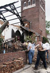5/5/03 - Jonathan Blair, a sophomore from Clinton, MS, helps salvage bricks from St. Luke's Episcopal Church in downtown Jackson.  The church was one of several buildings in the downtown area which were almost completely destroyed.