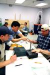 Don Van, engineering chair, supervises an experiment in the engineering lab. - Photo by Kristi McMurry