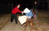 03/74/09 - Katherine Borucki, sophomore biology major, Beth Spain, sophomore journalism major, and Carri Russell, sophomore psychology major, participate in a short pillow fight in the Ayers courtyard.  
