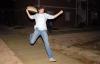 03/74/09 - Andrew Spena, junior music major, runs into a pillow fight in the Ayers courtyard.  