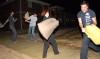 03/74/09 - Kellyn Clay, sophomore art major, Andrew Spena, junior music major, Blake Stannard, junior Biblical studies major, and Scott McSwain, junior Spanish major, participate in a pillow fight in the Ayers courtyard.