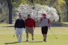 Members of Chuck Futrell's non-competing team Ryan Brown, Kenny Sutherland and Jerry Lynn Morris participate in Union's first Roy L. White Golf & Gala golf tournament. - Photo by Morris Abernathy