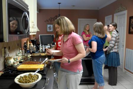Rebecca Eaton, sophomore mathematics major, partakes in a wonderful meal prepared by Alice Nettles, wife of professor Bill Nettes.  The Nettles hosted students as a part of Be Our Guest.