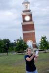 Millie Satterfield, sophomore sport management major, catches a water balloon at the amphitheater during a sophomore class event. - Photo by Kristi McMurry