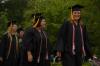 Sarah Conway makes her way to the Great Lawn to receive her Bachelor of Science degree in Chemistry at spring graduation. - Photo by Angela Abbamonte