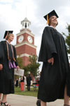 Graduates progress to their chairs on the Great Lawn at Spring Graduation 2003. - Photo by Jim Veneman