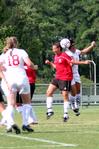 08/19/09 - Bridget Roney, sophomore athletic training major, goes up for a header against her Christian Brothers opponent.