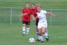 08/231/09 - Katelin Dirksen, senior business administration major, dribbles ahead of two Christian Brothers opponents.