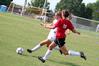 8/19/09 - Evie Felts, freshman, prepares to pass the ball to keep it away from her Christian Brothers opponent. - Kristi McMurry