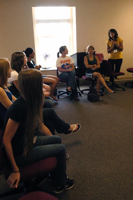 Hailey Gallagher, junior marketing major, welcomes her Focus Group to Union.