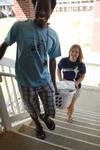 Derique Cannon, sophomore electrical engineering major, helps Ginny Stiles, sophomore elementary education major, move things into her room in the Quads. - Photo by Sarah Palmer