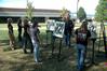 Chris Nadaskay, professor of art, teaches his Drawing I class outside in the grove. - Photo by Beth Spain