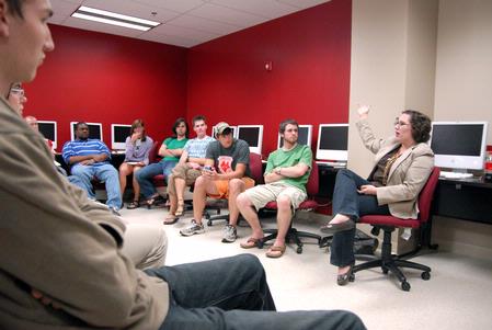 Melinda Eckley, assistant professor of art, leads a meeting for the Union chapter of the American Advertising Federation.