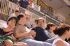 Matt Lunsford, professor of mathematics, Gene Fant, dean of the college of arts and sciences, and their families enjoy college night at Pringles Park.  Many faculty and students came out for the Diamond Jaxx game. - Photo by Kristi McMurry
