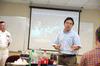 Haifei Li, professor of computer science, introduces the speaker from the Navy for an ACM meeting. - Photo by Kristi McMurry