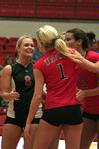 The Lady Bulldog volleyball team celebrates a point in their game against Martin Methodist.  The women won this match 3-0. - Photo by Kristi McMurry