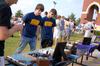 The men of ATO set up their table at the IFC cookout at the beginning of Rush. - Photo by Kristi McMurry
