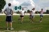 Coach Johnson watches the men's cross country team during practice. - Photo by Sarah Palmer