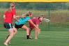 The Onions, an independent intramural team, battle it out with their Zeta opponents in an ultimate frisbee game. - Photo by Kristi McMurry