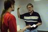Terry Lindley, professor of history, speaks to Travis Lutz, junior history major, after a Phi Alpha Theta member induction meeting. - Photo by Sarah Palmer