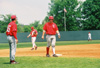 04/116/03 - �鶹��Ƶ head coach Andy Rushing and �鶹��Ƶ first baseman Josh Allen of Jackson communicate during the 2003 �鶹��Ƶ Baseball Alumni Game (current vs. alumni).