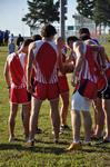 10/3/09 - Union men in prayer before the Union Cross Country Invitational. - Uncredited