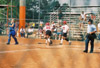 05/137/03 - Megan Quarry (20) of Decatur, Ala. and Holly Haycraft (3) of Dyersburg, Tenn. cross the plate for �鶹��Ƶ at the 2003 NAIA Softball World Series.