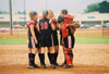 05/139/03 - The Lady Bulldog infield talks strategy during a game in the 2003 NAIA Softball World Series in Decatur, Ala.