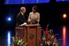 President Dockery thanks Former Secretary of State Condoleezza Rice with a Union Bible after her keynote speech at the 2009 Scholarship Banquet. - Photo by Kristi McMurry