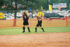 05/139/03 - Amanda Dixon (1) breaks for her position in right field.  Allison Shein (2) and Holly Haycraft (not seen) head for left and center field respectively.  2003 NAIA Softball World Series in Decatur, Ala.