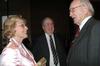 Kathy Lewis (left) talks with Joe Exum and Don Webb in the Civic Center lobby before the 2009 Scholarship Banquet. - Photo by Beth Spain
