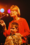 St. Jude patient Chandler and his mother speak about the miracle of St. Jude and how their faith in Christ got them through Chandler's bout with a catastrophic disease during <i>Up 'Til Dawn</i>. - Photo by Justin Veneman