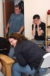 Kevin and Jennifer Scalf spend time with their son Matt (center), junior digital media studies major, in his dorm. - Photo by Kristi McMurry